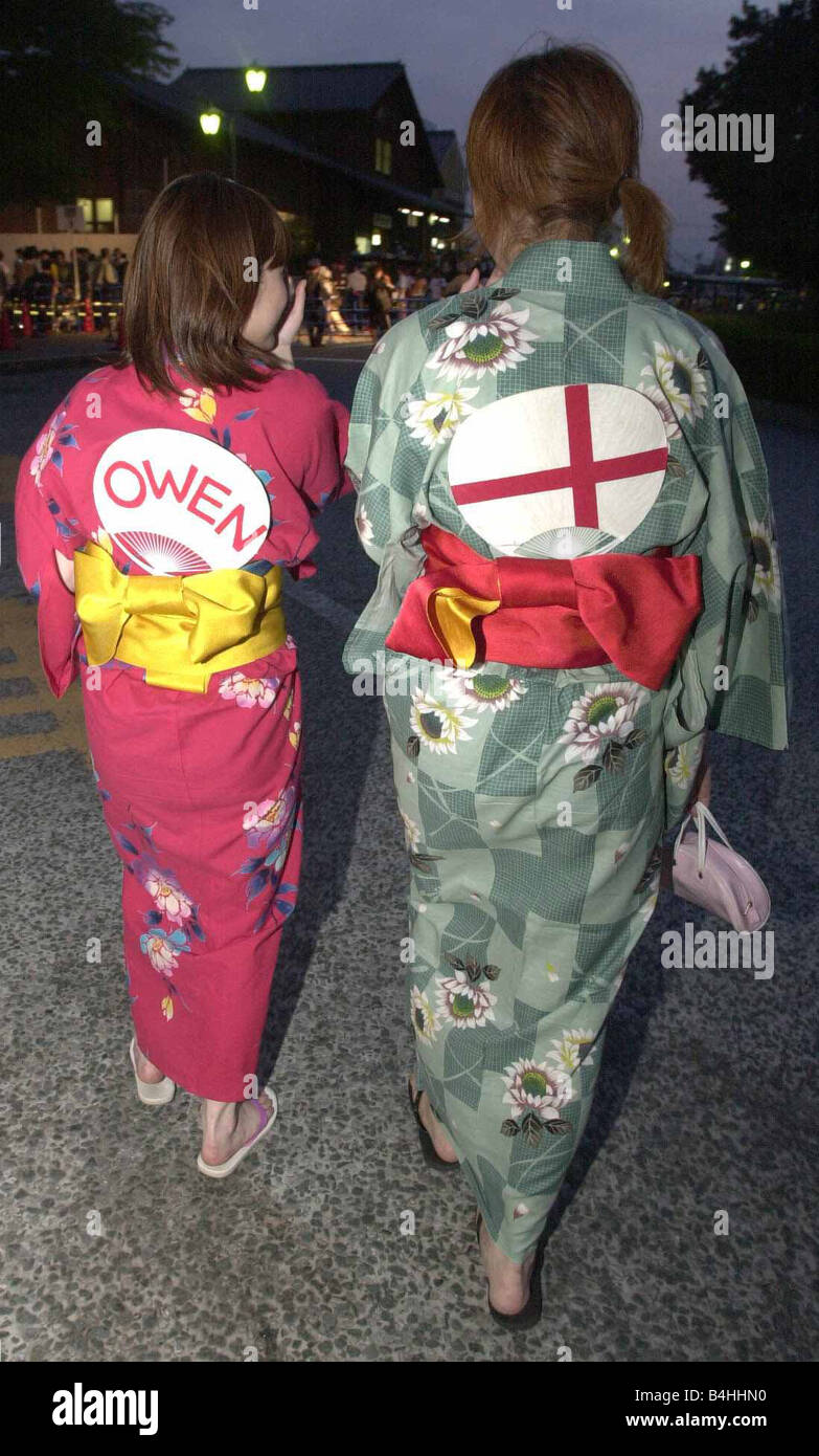 June 2002 Disappointed traditionally dressed Japanese England supporters after the England v Brazil match Stock Photo