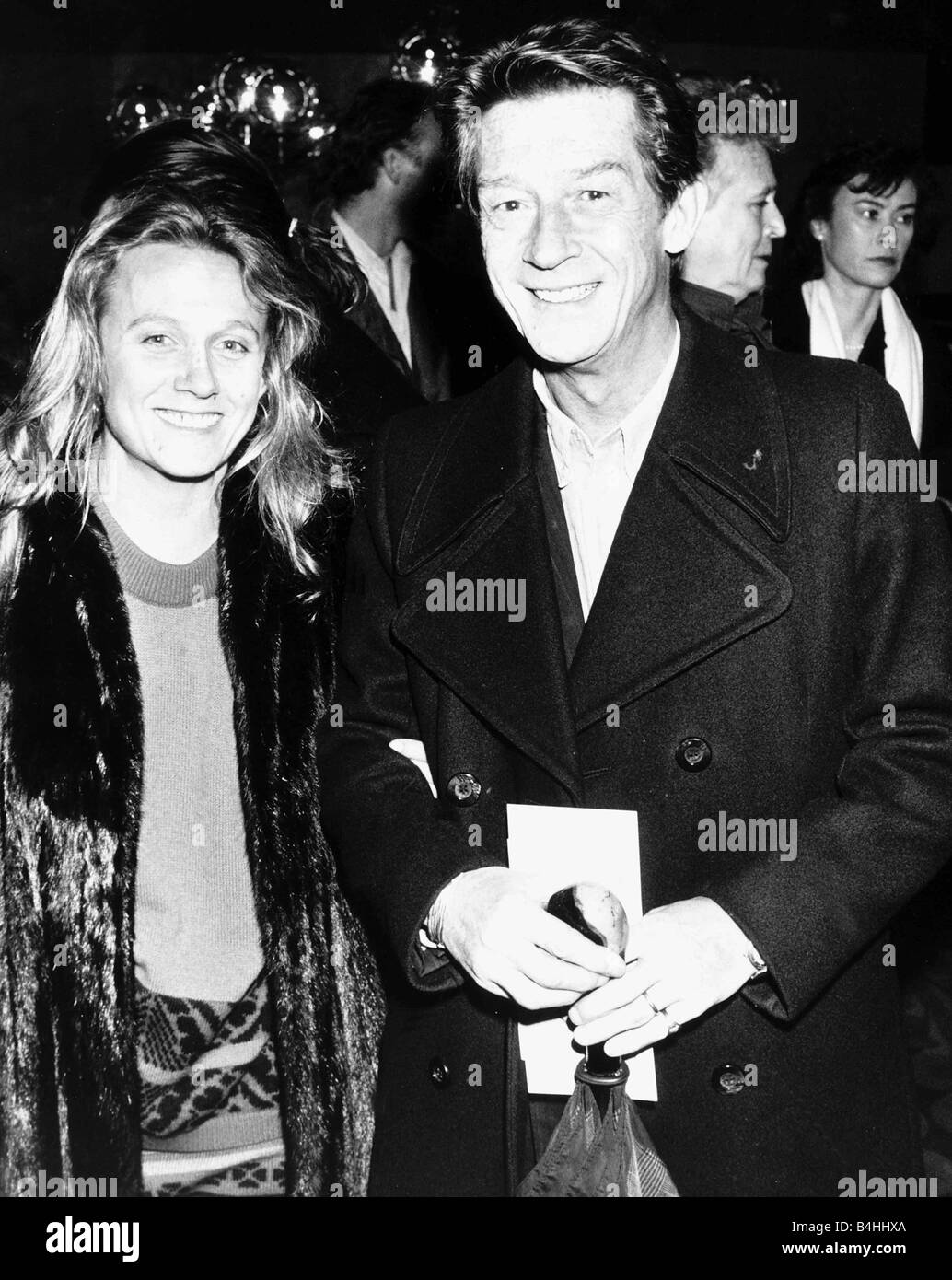 John Hurt British film actor and wife at film premiere in February 1988 Stock Photo