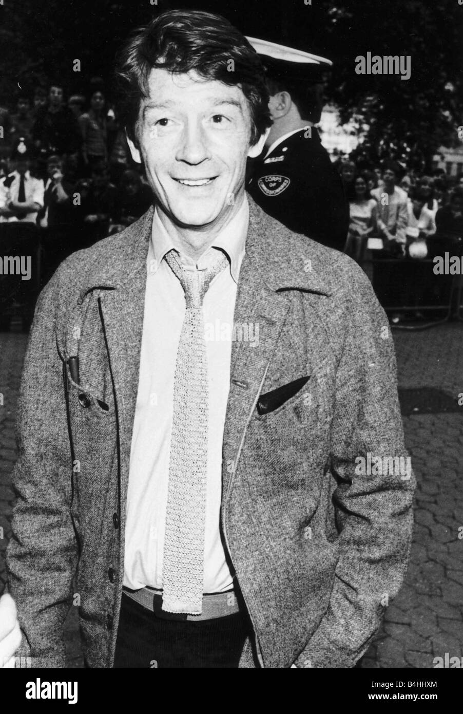 John Hurt British film actor entering film premiere in July 1982 Stock Photo