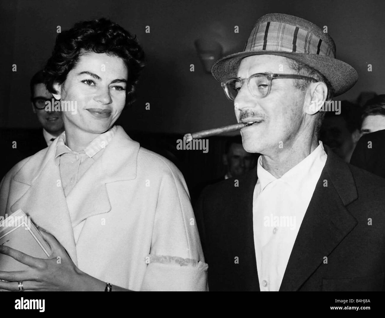 Groucho Marx American comedy actor with his wife August 1958 Stock Photo