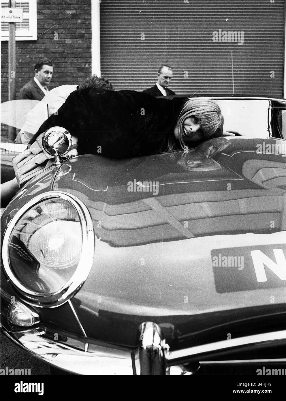 Britt Ekland actress with her E Type Jaguar car in 1967 Stock Photo