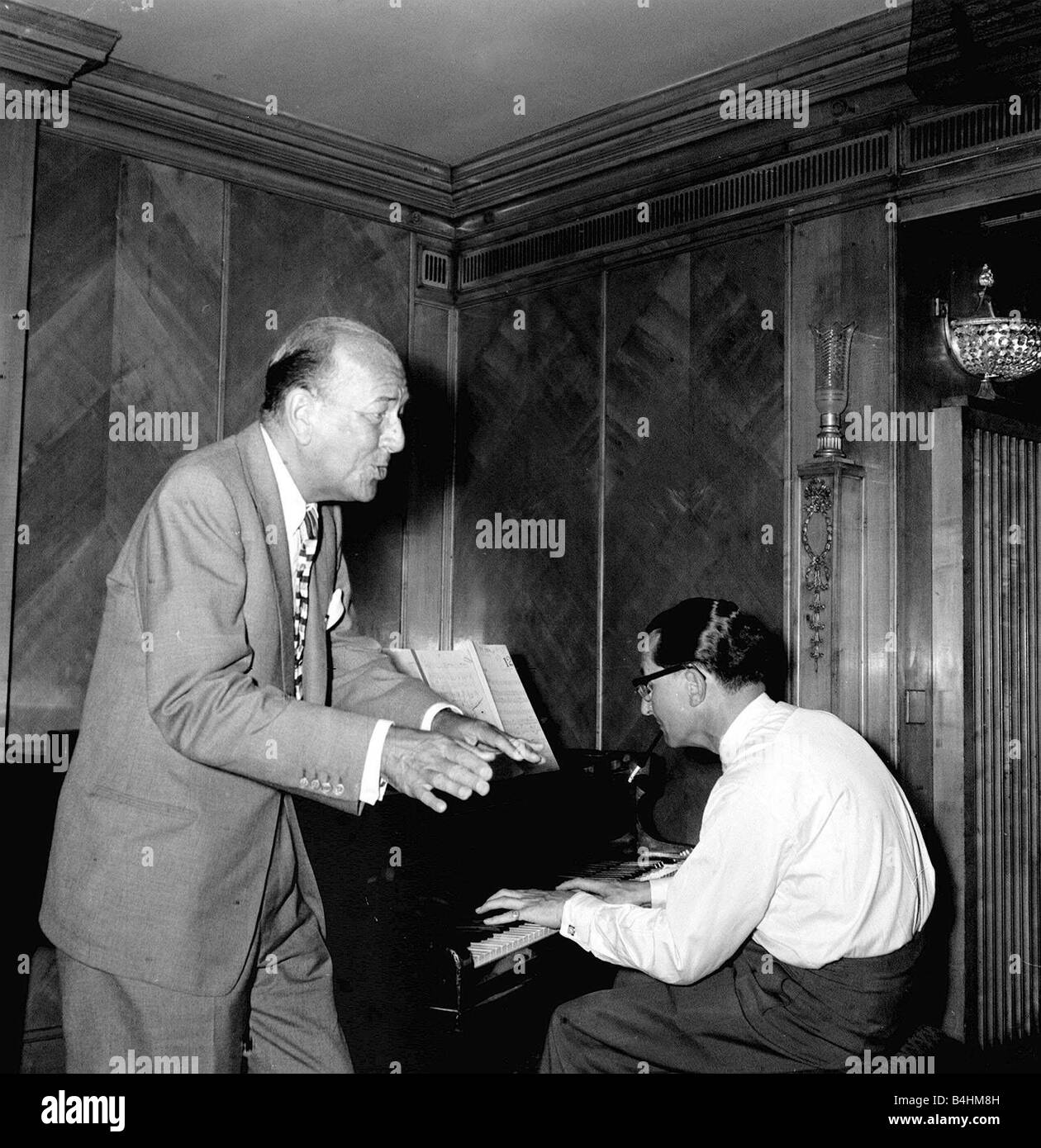 Noel Coward actor and playwright performing at the Dorchester Hotel London July 1958 Stock Photo