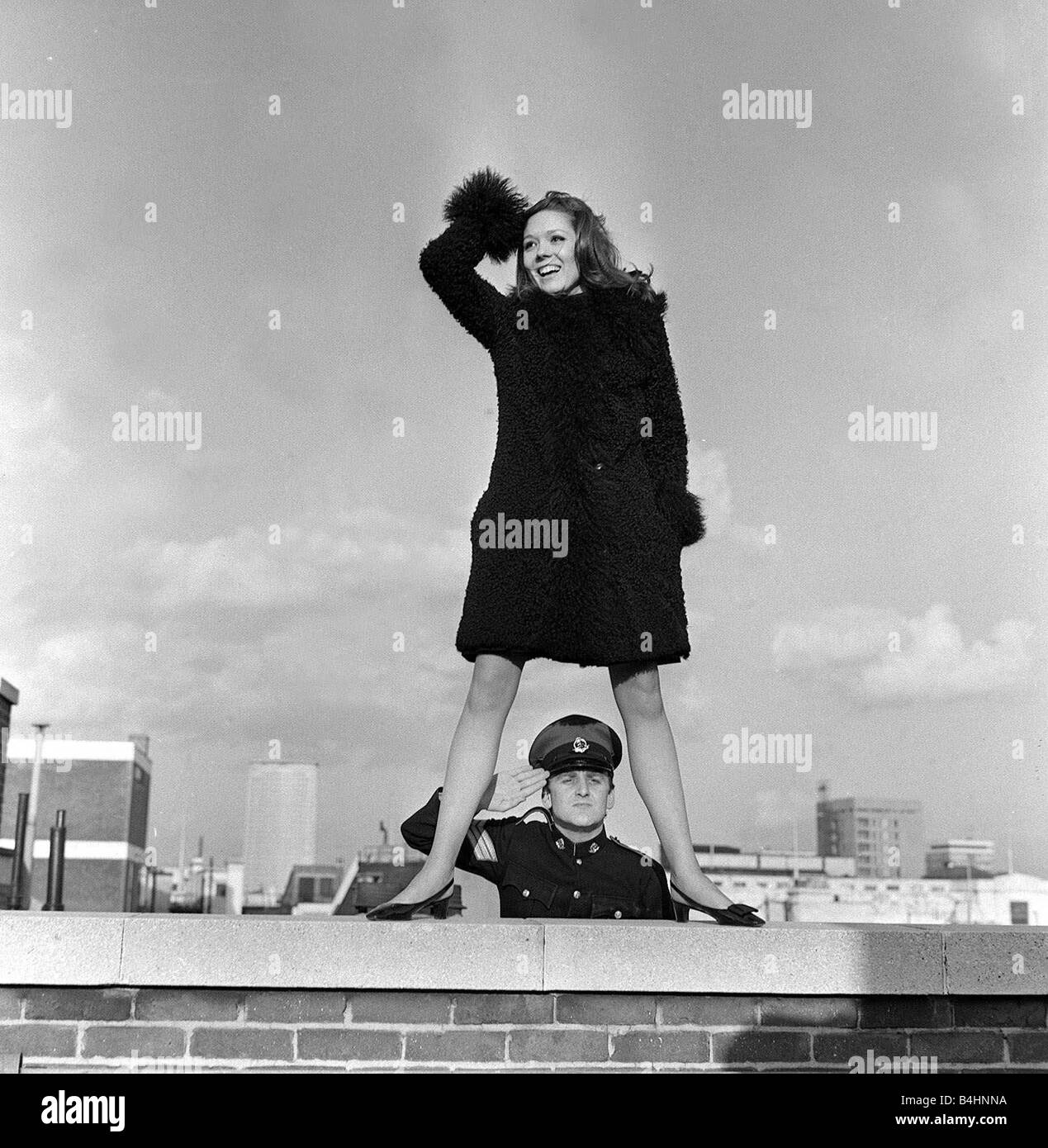 John Thaw March 1966 Actor aged 24 years old starring as Sgt John Mann in ABC Production Redcap for BBC Television Pictured with Diana Rigg Actress during Photocall on the roof of ABC TV in Hanover Square London Diana Rigg Emma Peel star of The Avengers TV Programme current series just ended wishes luck to John Thaw whose new Redcap series is about to begin Mirrorpix Stock Photo