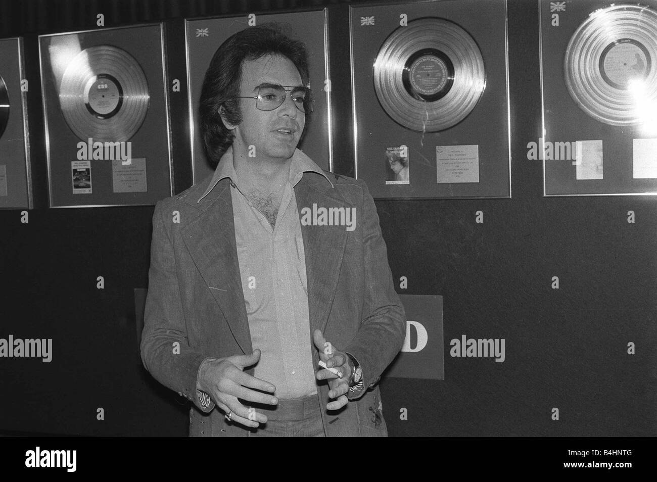 Singer and actor Neil Diamond Disc on wall Cigarette June 1977  LAFjan05 24th January marks the birthday of Neil Diamond born in Stock Photo