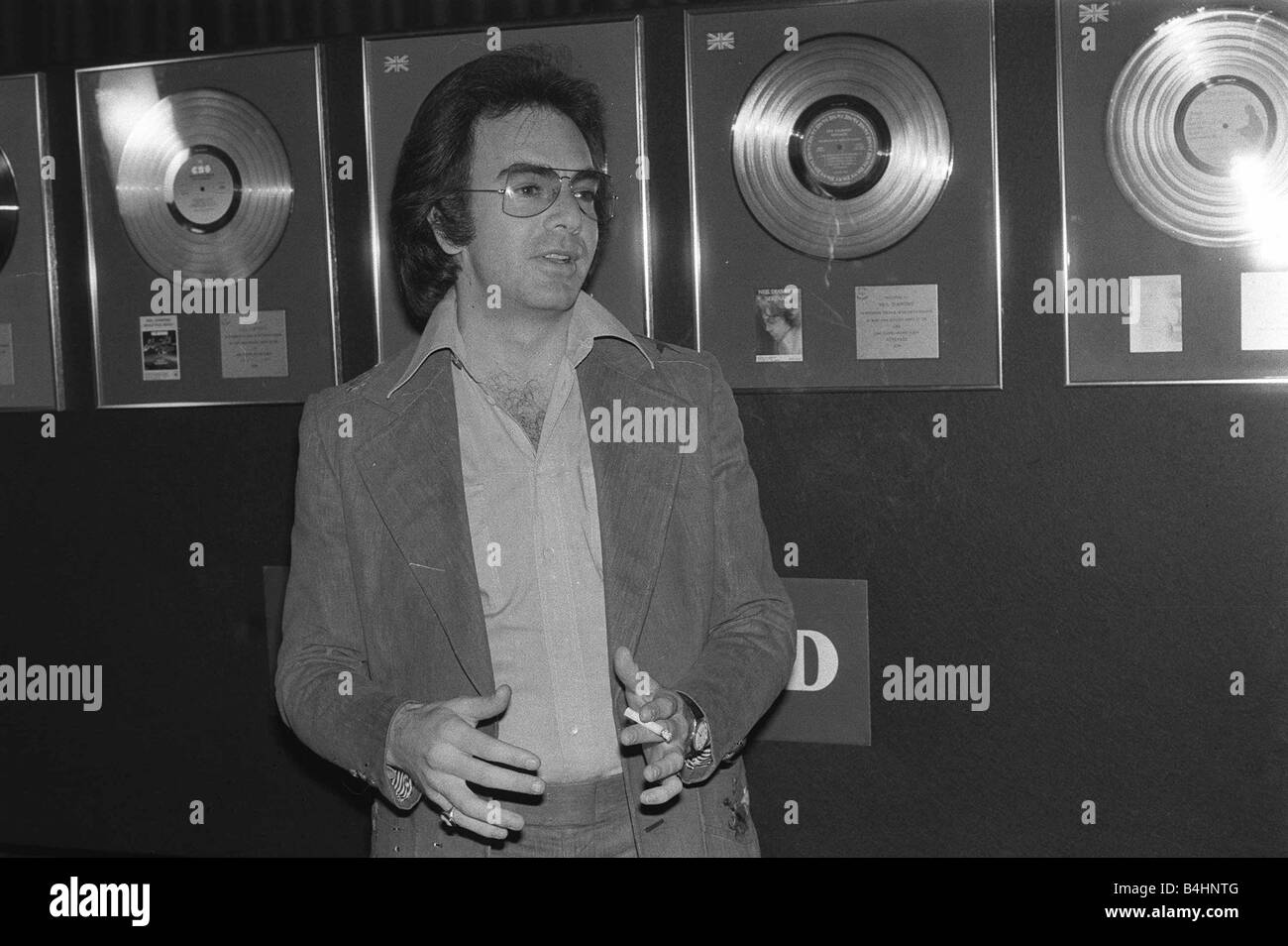 Singer and actor Neil Diamond Disc on wall Cigarette June 1977 LAFjan05