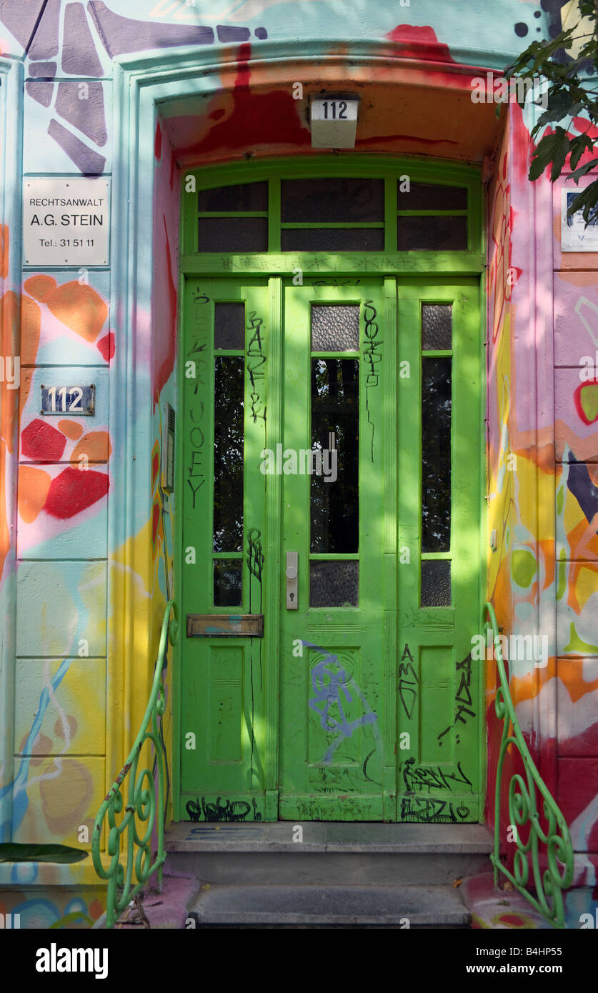 A green office door in the St Pauli district of Hamburg Stock Photo