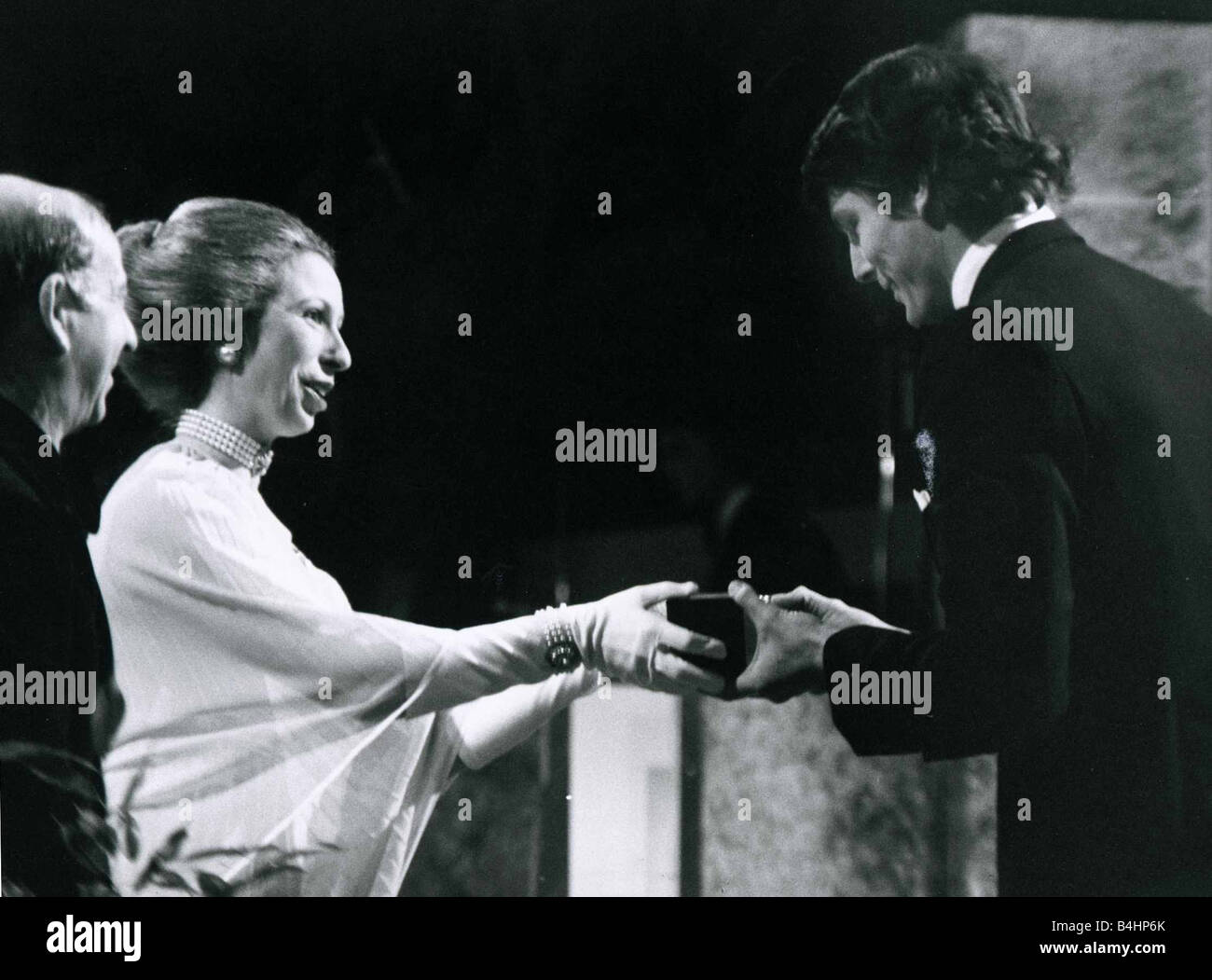 Princess Anne presents actor Christopher Reeve with the BAFTA award for the most promising newcomer following his appearence in Stock Photo
