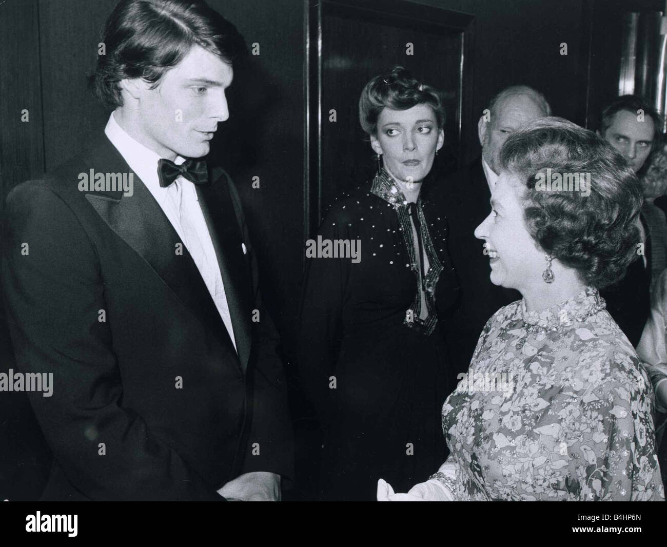 HRH Queen Elizabeth II meets actor Christopher Reeve following the film premiere of Superman the Movie at the Empire Leicester Square London Stock Photo