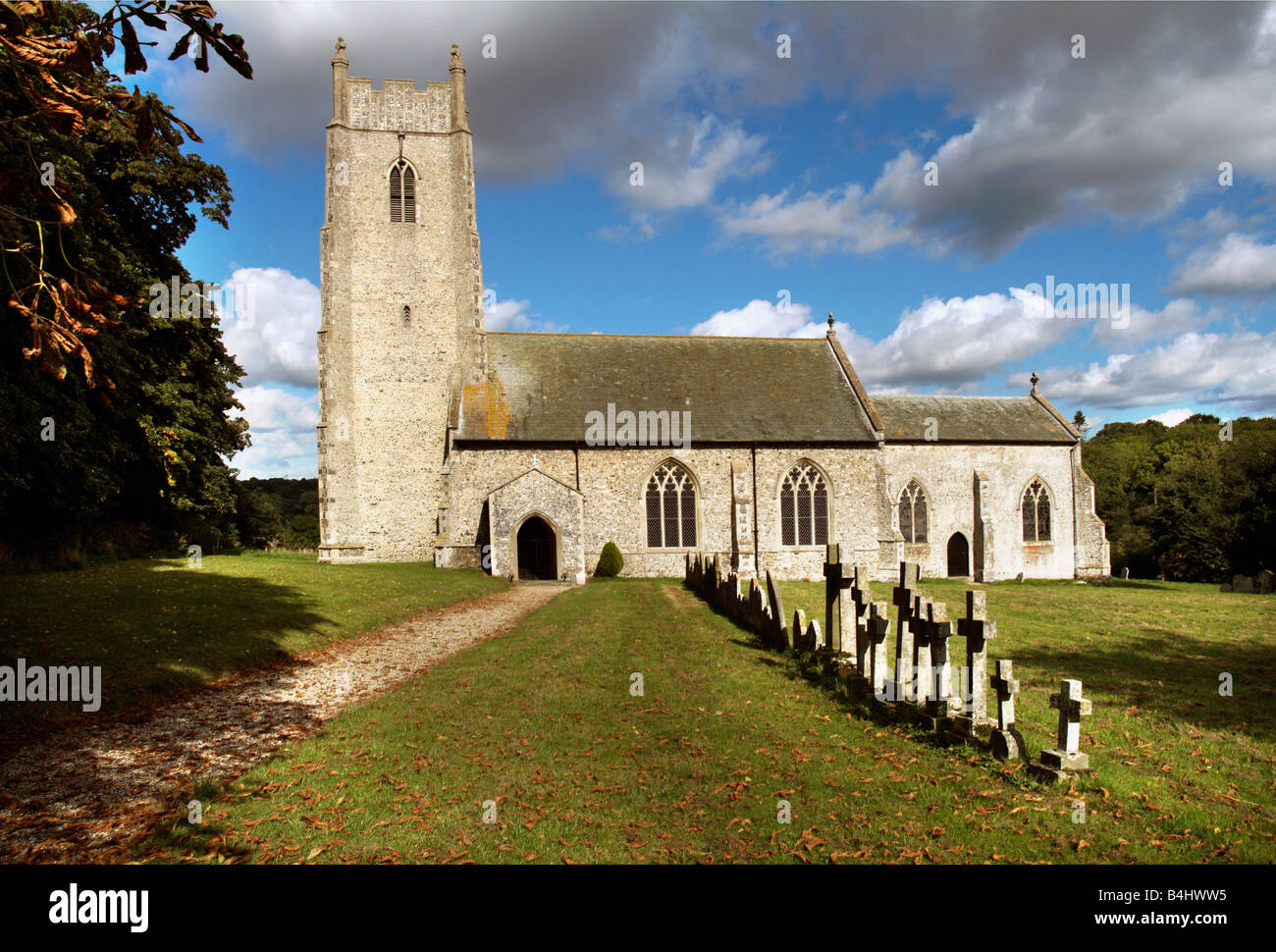 bright sunny direct view of Saint Andrew s Church Honingham Norfolk England Europe Stock Photo