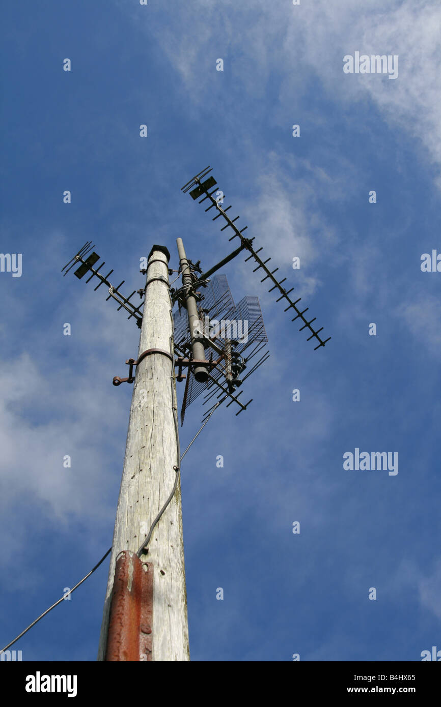 tv aerials on high pole Stock Photo Alamy
