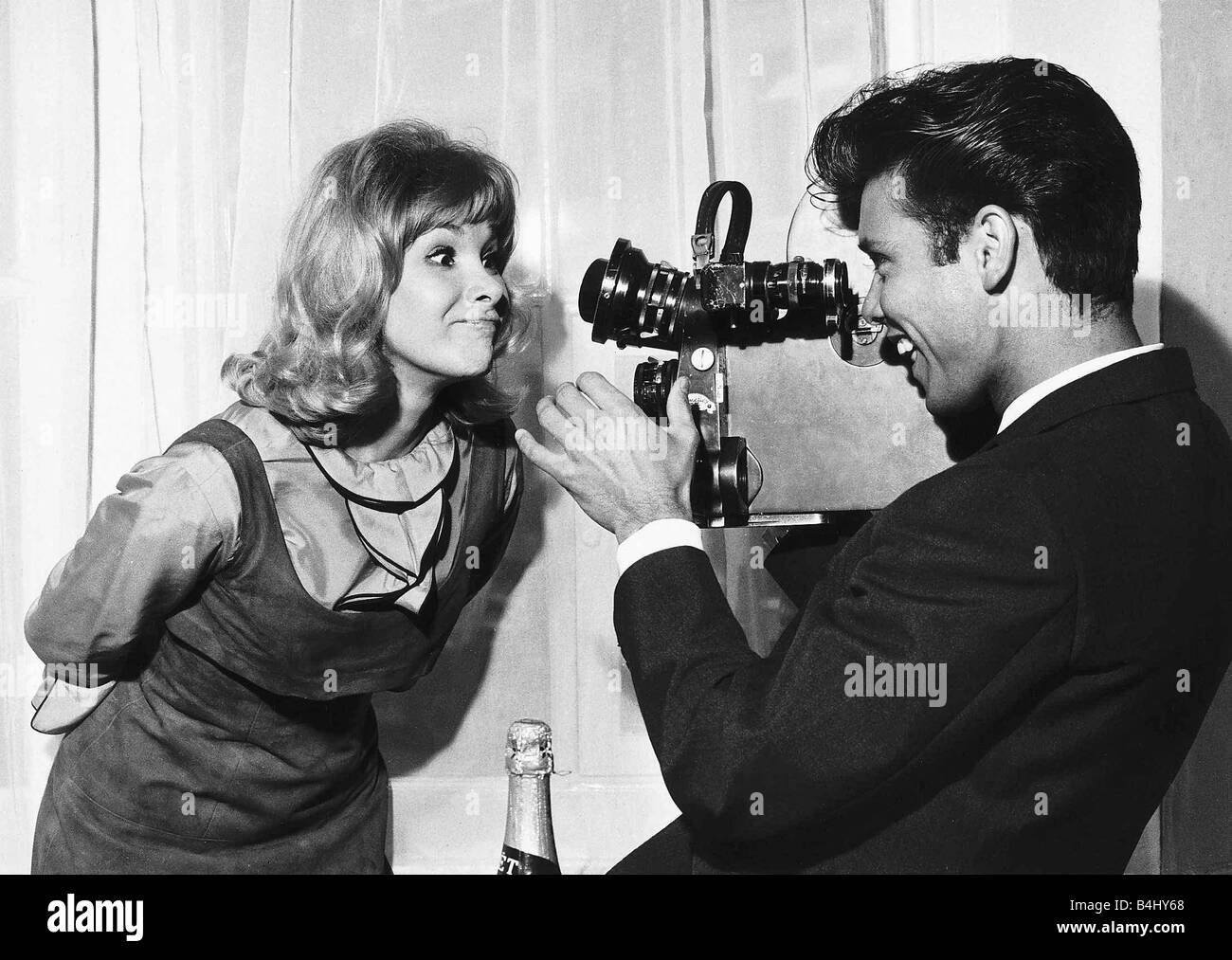 Cliff Richard Singer Actor gets behind the camera to film his co star  pulling a funny face Stock Photo - Alamy