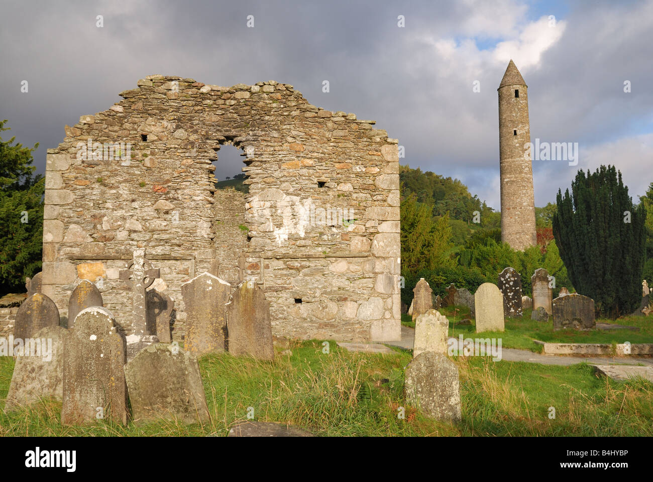 Cementery with old tombstones on monastic site in Glendaloug near Dublin Ireland at sunrise Stock Photo