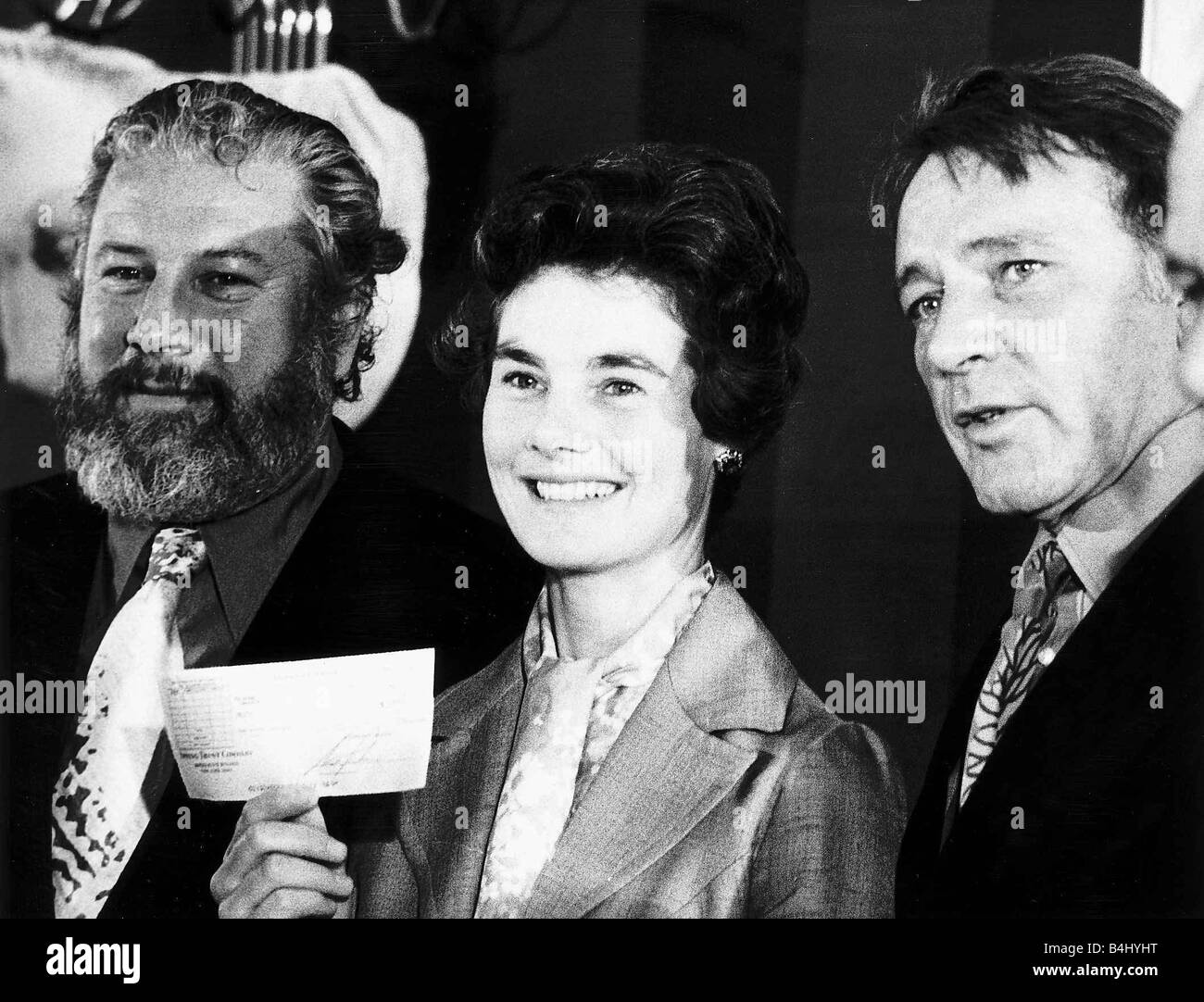 Peter Ustinov Actor July 1972 Ambassador for UNICEF with Lady Countess Limerick President of the United Kingdom Commitee for UNICEF receiving a cheque worth 19 000 from Richard Burton Actor DBase MSI Stock Photo