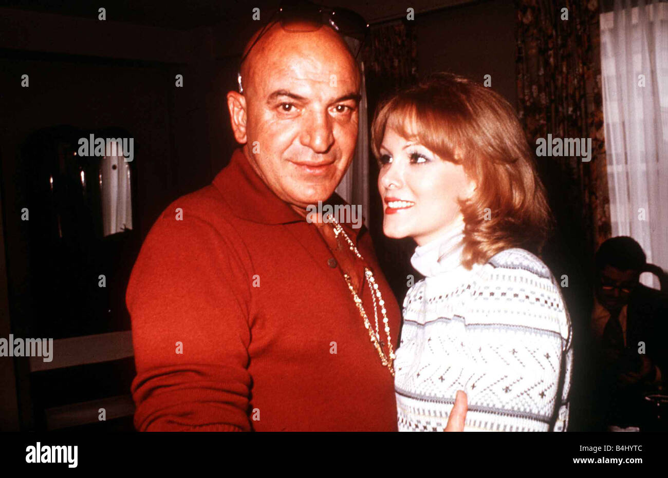 Telly Savalas the actor from Kojak with his girlfriend Marce Hamsen February 1977 Dbase Msi Stock Photo