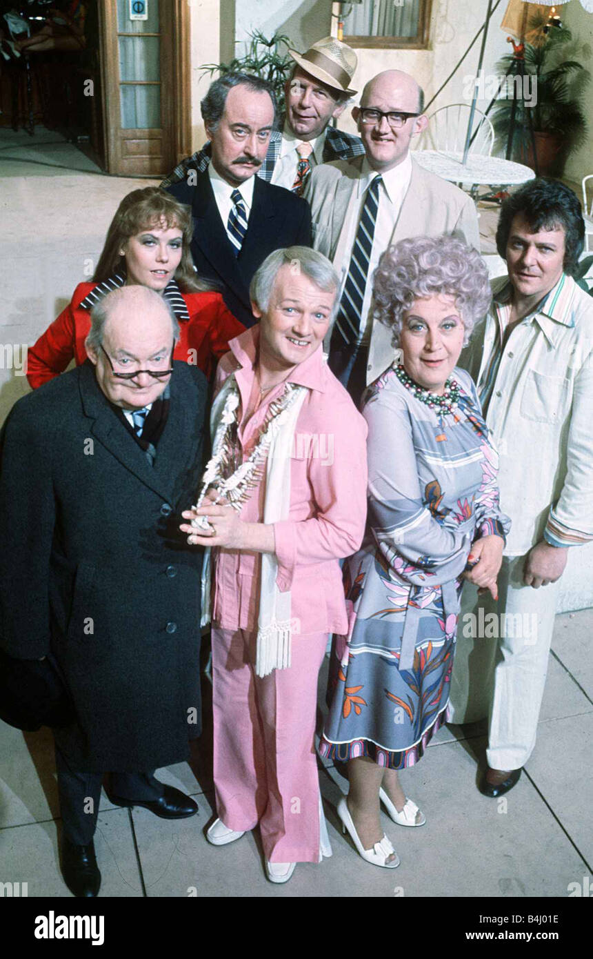 Films Are You Being Served the staff of Grace Brothers starring from back to front left to right Arthur English actor Frank Thornton actor Nicholas Smith actor Wendy Richard actress Arthur Brough actor John Inman actor Mollie Sugden actress Trevor Bannister actor August 1977 dbase msi Stock Photo