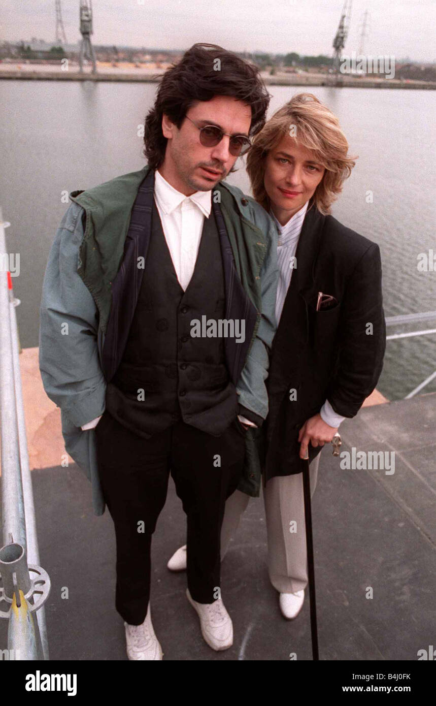 Charlotte Rampling actress with her husband Musician Jean Michelle Jarre standing in front of a river Stock Photo