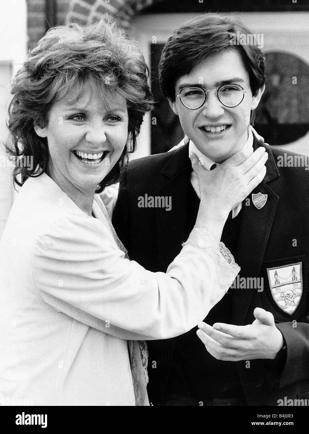 Lulu the singer and actress with Sam Marco in The Growing Pains of Adrian Mole July 1986 Stock Photo