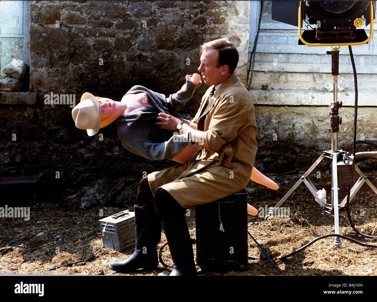 Christopher Timothy actor together with a blow up doll on the set of the TV programme All Creatures Great Small August 1989 Stock Photo