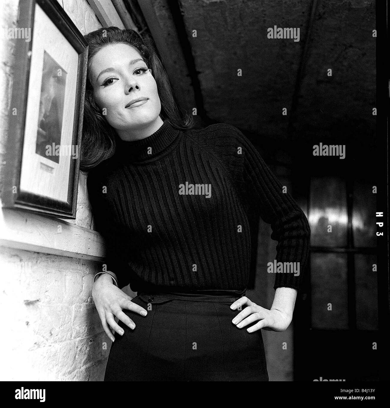 Actress Diana Rigg star of New Avengers 1964 hand on hip Stock Photo