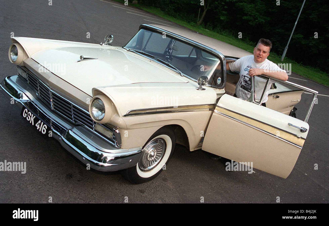 Ian Sharp with his beige 1957 Ford Fairlane Stock Photo