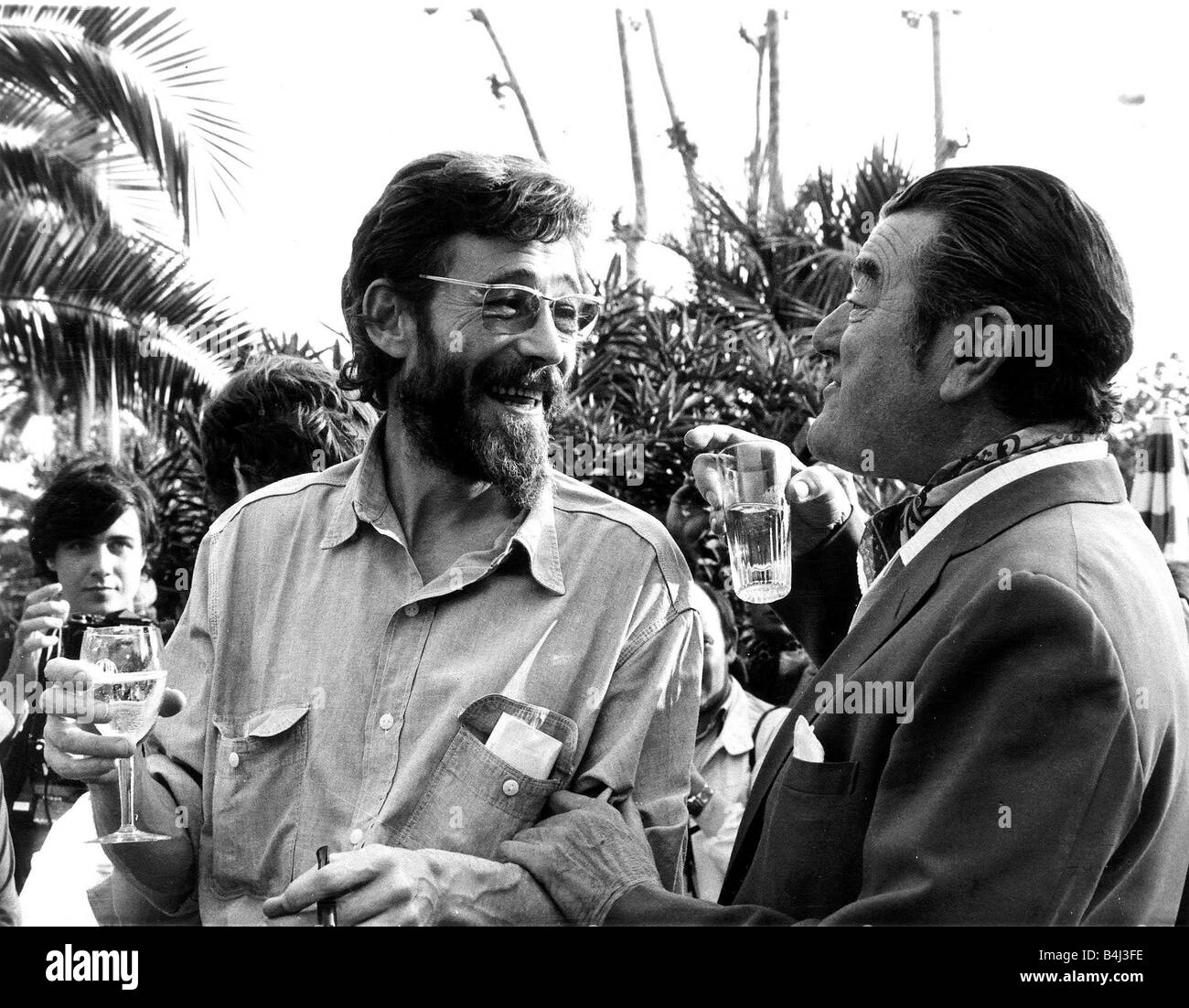 Actor Peter O Toole L May 1972 Chatting to Jack Hawkins at a Cannes champagne party in the South of France at an Annual film festival LMAH003 Stock Photo
