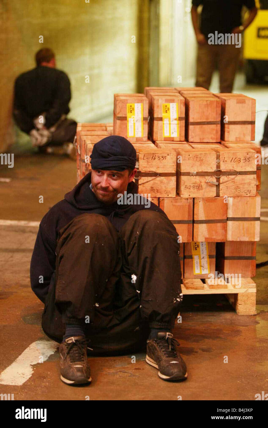 Armed policemen and robbery suspects at the scene of an attempted 30