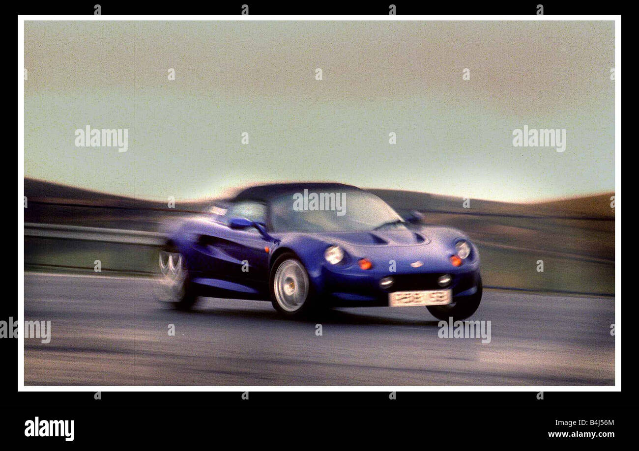 Blue Lotus Elise car March 2000 being driven along road Stock Photo