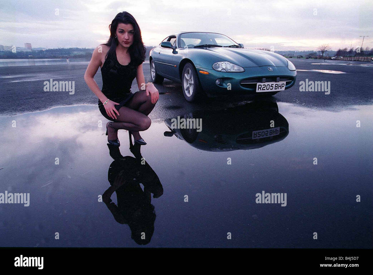 Miss scotland Isla Sutherland January 1998 pictured alongside a Jaguar XK8 car Stock Photo