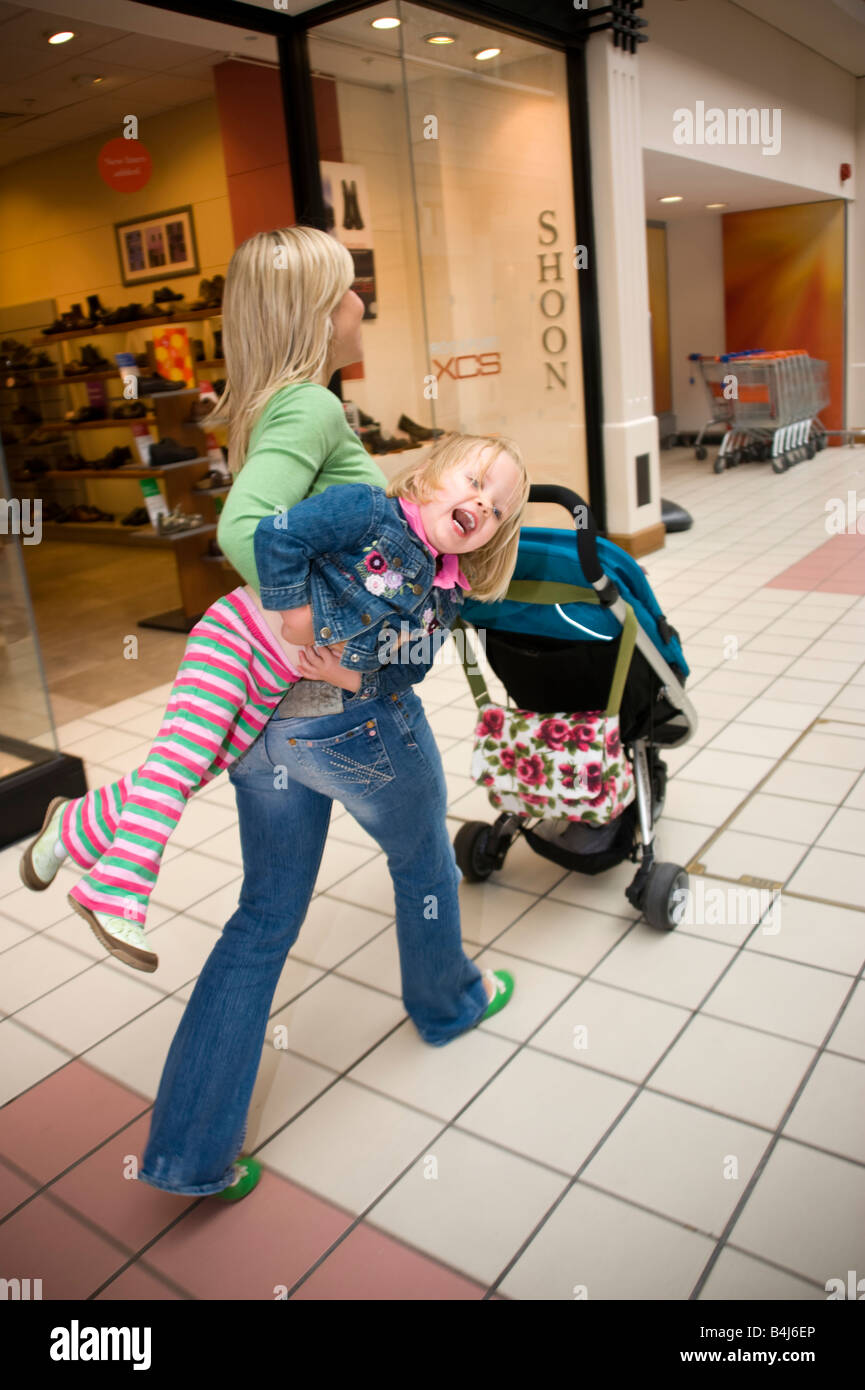 little girl having a tantrum in a shopping centre Stock Photo Alamy