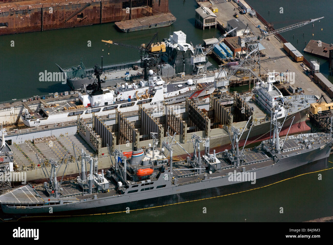 aerial above San Francisco pier US Coast Guard  Merchant Marine vessels Stock Photo