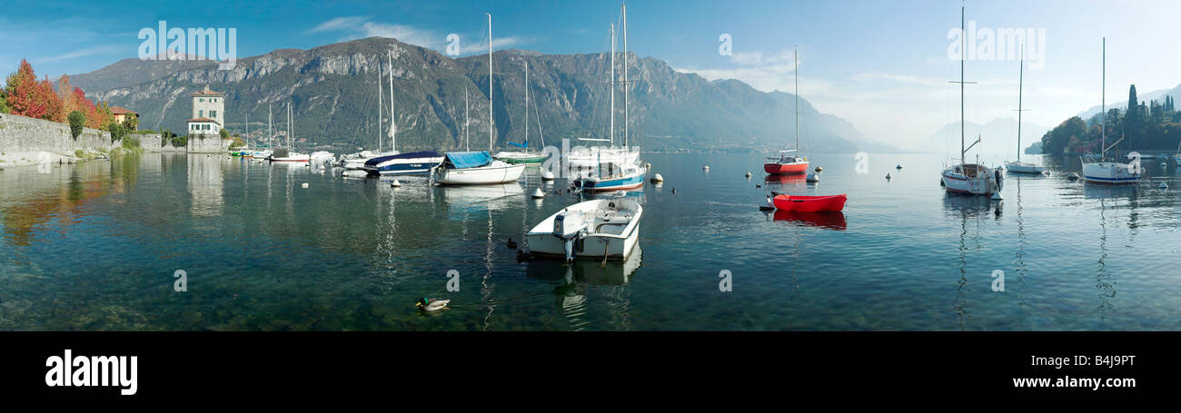 Panorama of Lake Como from Pescallo with sailing and power boats looking at mountains in autumn Stock Photo