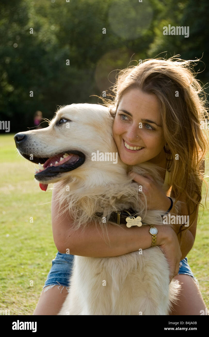 portrait of teenage girl with her dog Stock Photo - Alamy