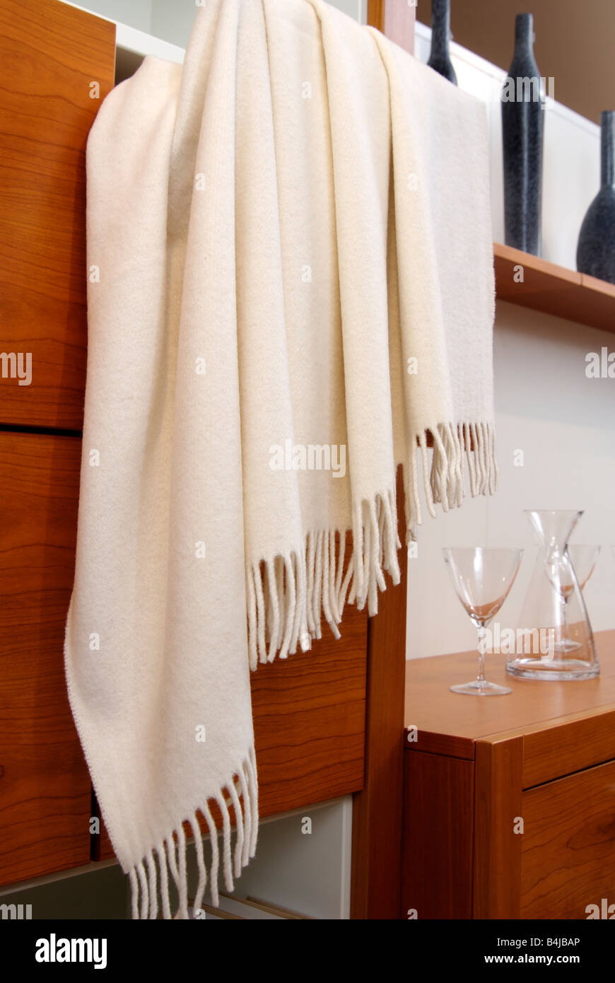 Blanket draped over a door Stock Photo Alamy