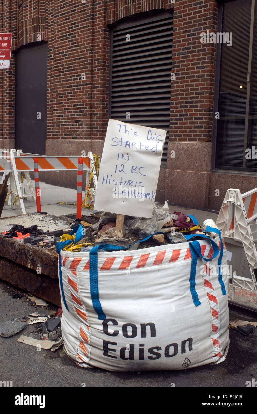 A humorous sign posted on top of debris at a Con Ed excavation site in the Tribeca neighborhood of New York Stock Photo