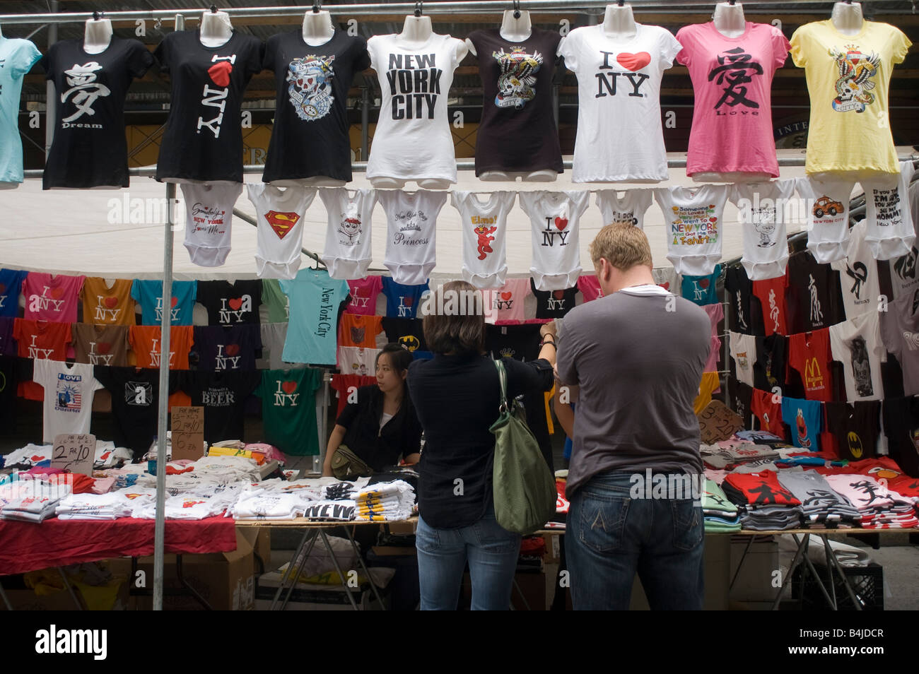 NYC souvenir T shirts for sale at a street fair in midtown in New York