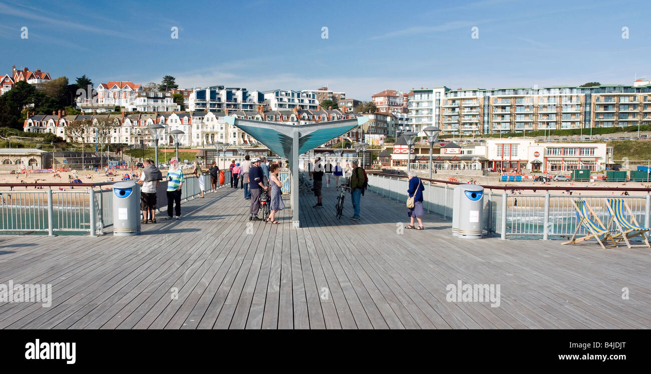 Wide angle view looking down Boscombe Pier towards the beach and seafront property and attractions Stock Photo