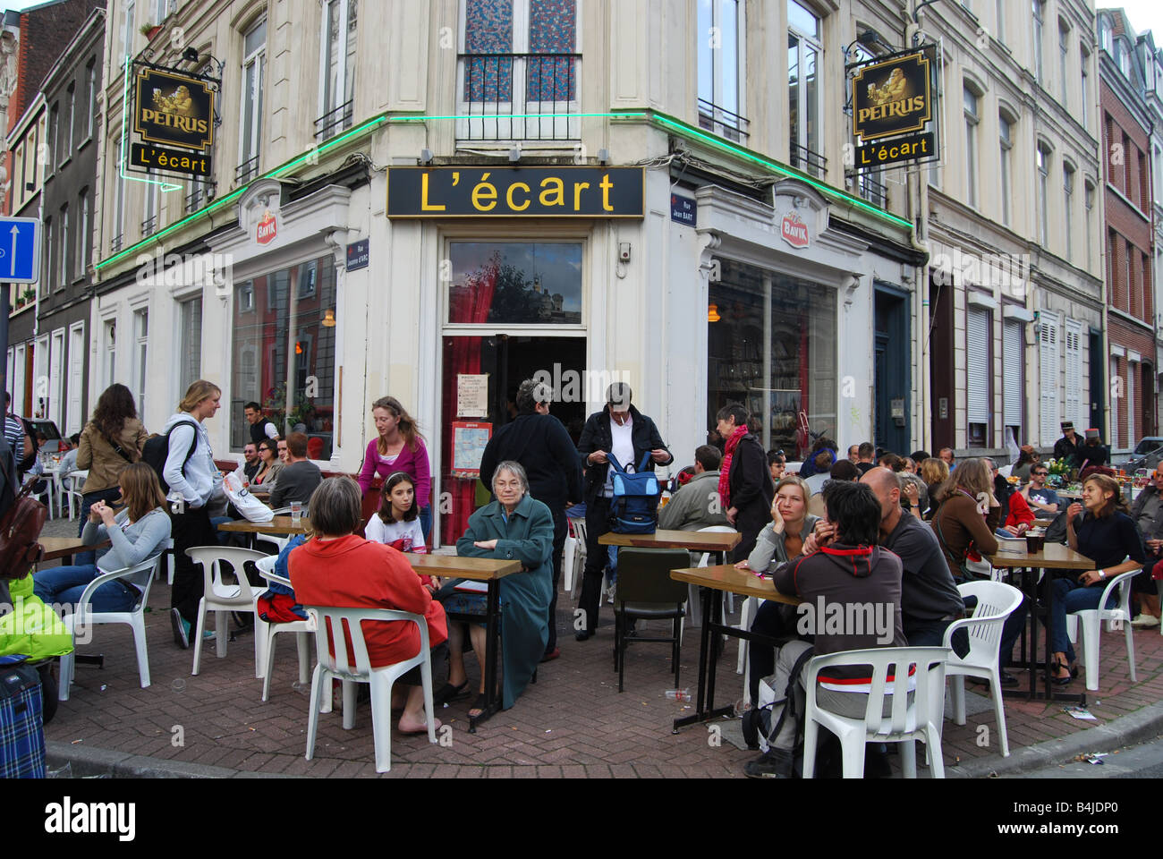 having a break at a cafe l'écart at Lille Braderie France Stock Photo