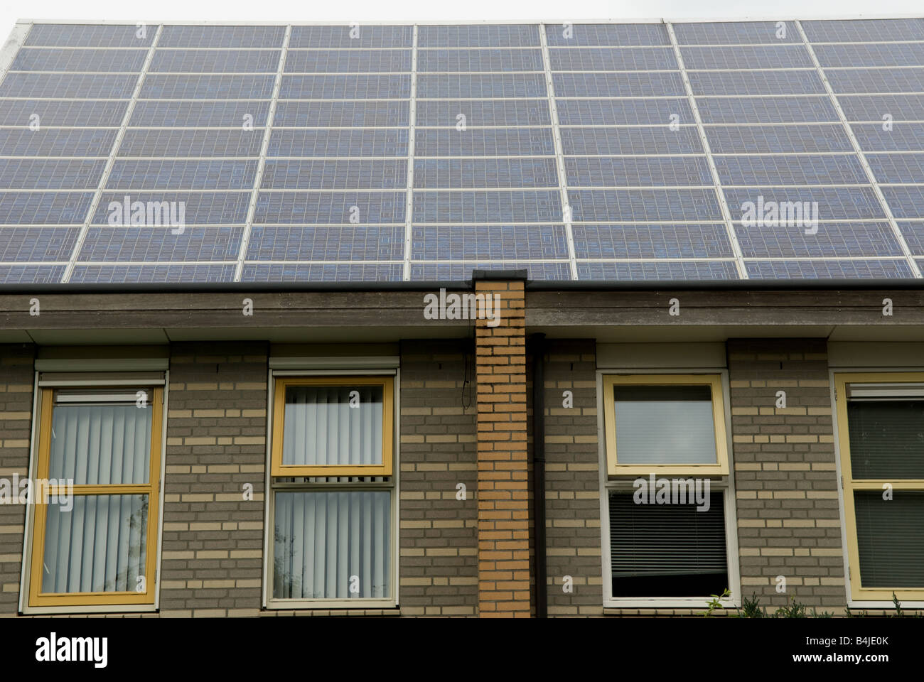 Shell solar panels fitted to houses on the world's largest solar powered housing estate, Nieuwland, Amersfoort, Netherlands. Stock Photo