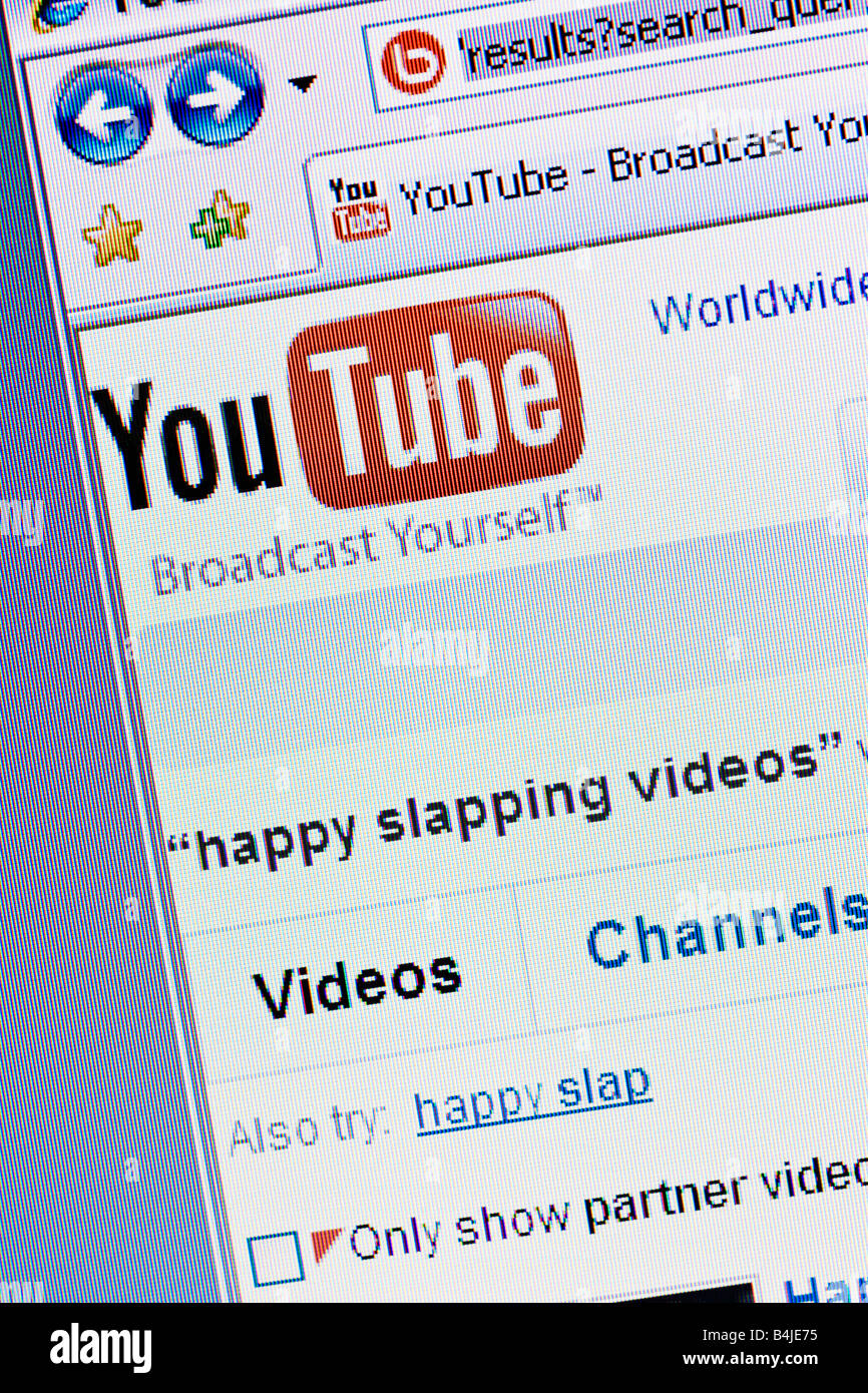 Youtube video website screen and logo showing search for happy slapping videos Stock Photo