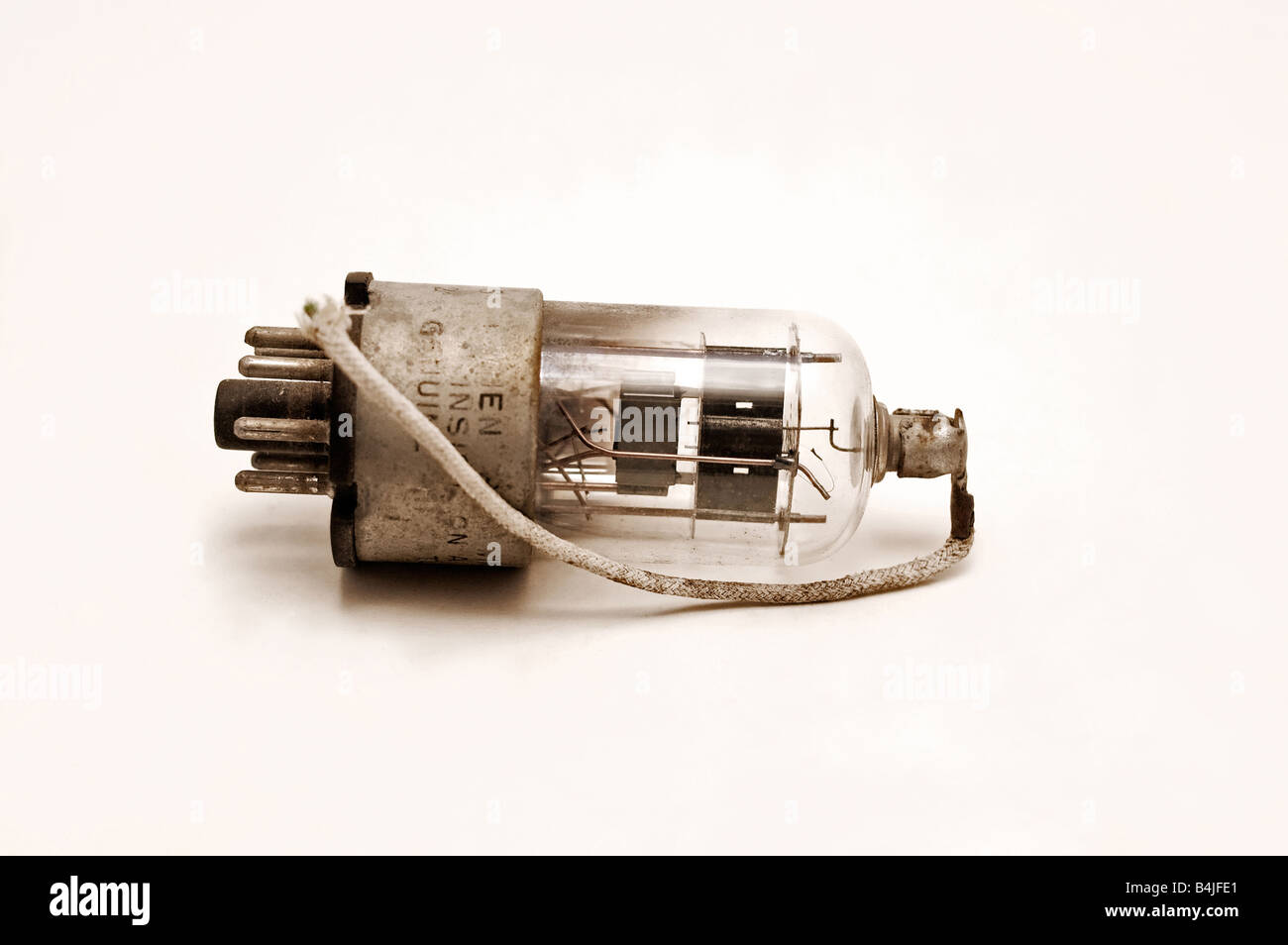Old dirty vacuum tube isolated on white Stock Photo