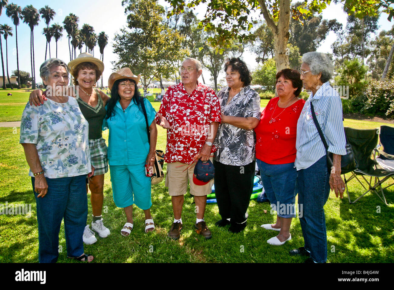 Elder members of the Acjacheman Native American tribe pose for a group portrait at an annual gathering in San Juan Capistrano CA Stock Photo