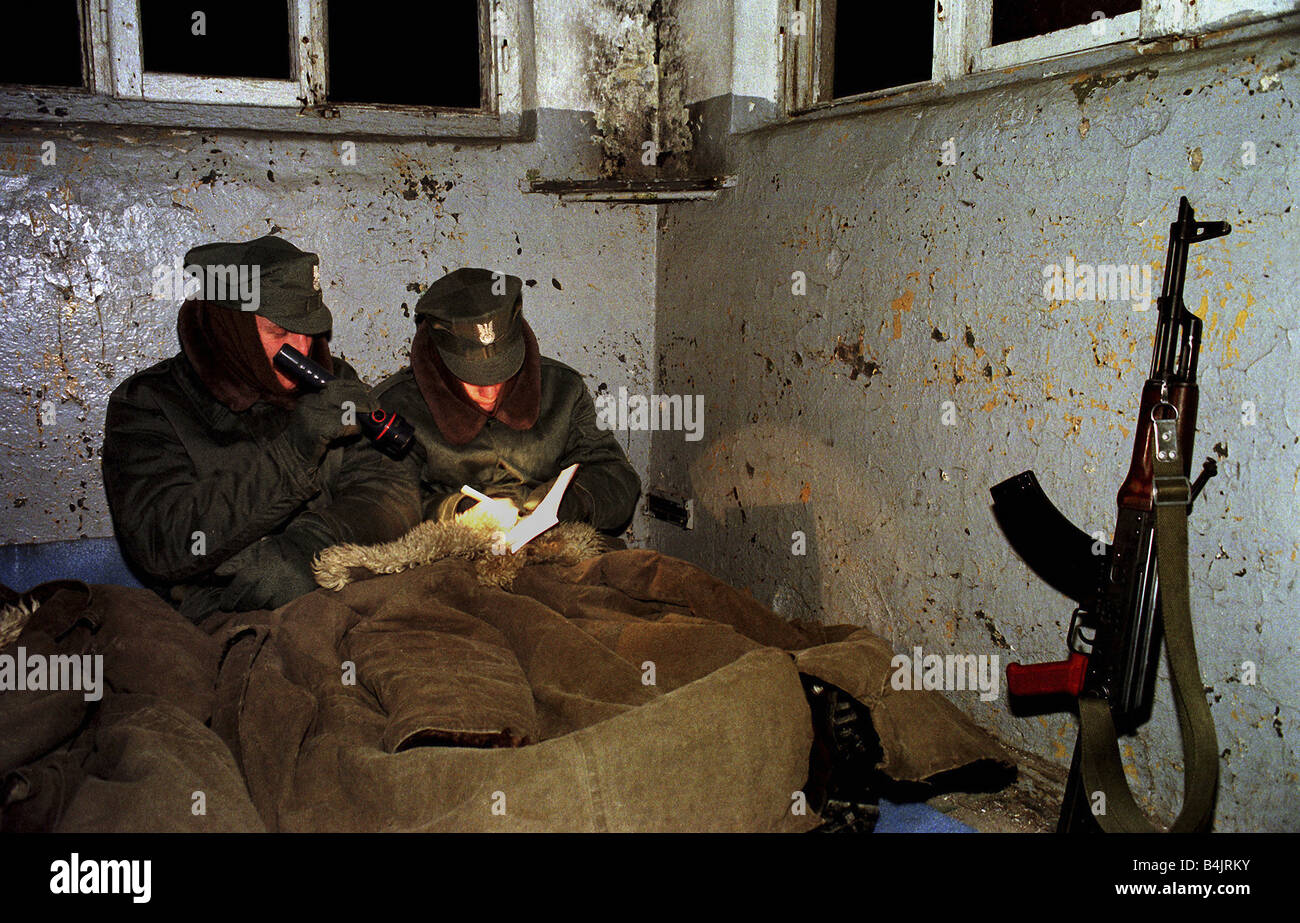 Polish border guard officers at a checkpoint during a night patrol, Poland Stock Photo