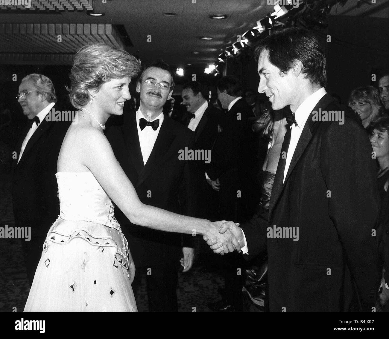Timothy Dalton actor meeting Princess Diana attending the charity premiere of The Living Daylights at the Odeon Leicester Square June 1987 DBase Stock Photo