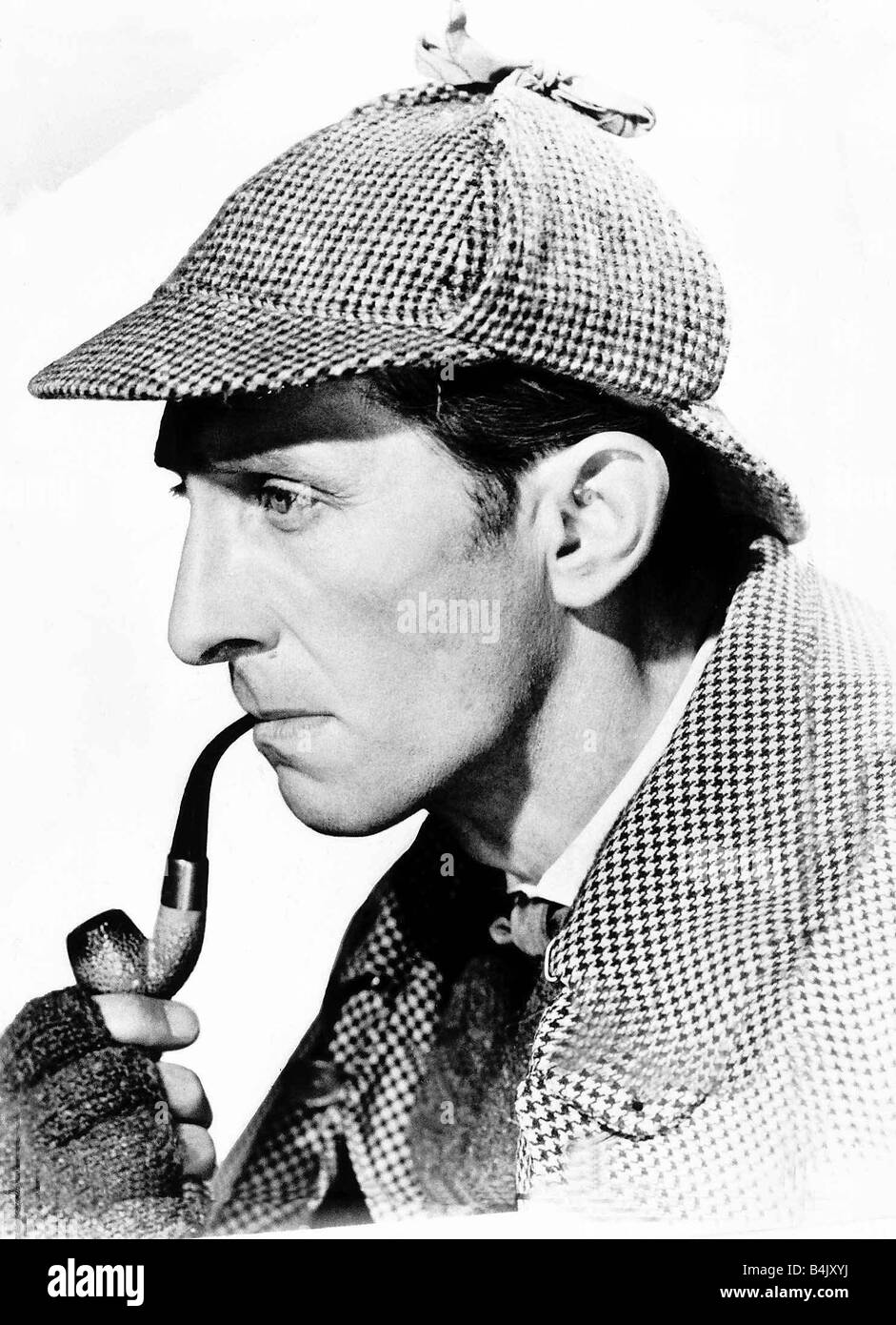 Peter Cushing December 1968 Actor born Kenley Surrey 26 May 1913 OBE 1989 married 1943 Helen Beck died 1971 died Canterbury 11 August 1994 memorable as Sherlock Homes in both The Hound of the Baskervilles 1959 This picture is a portrait of him smoking a pipe Stock Photo