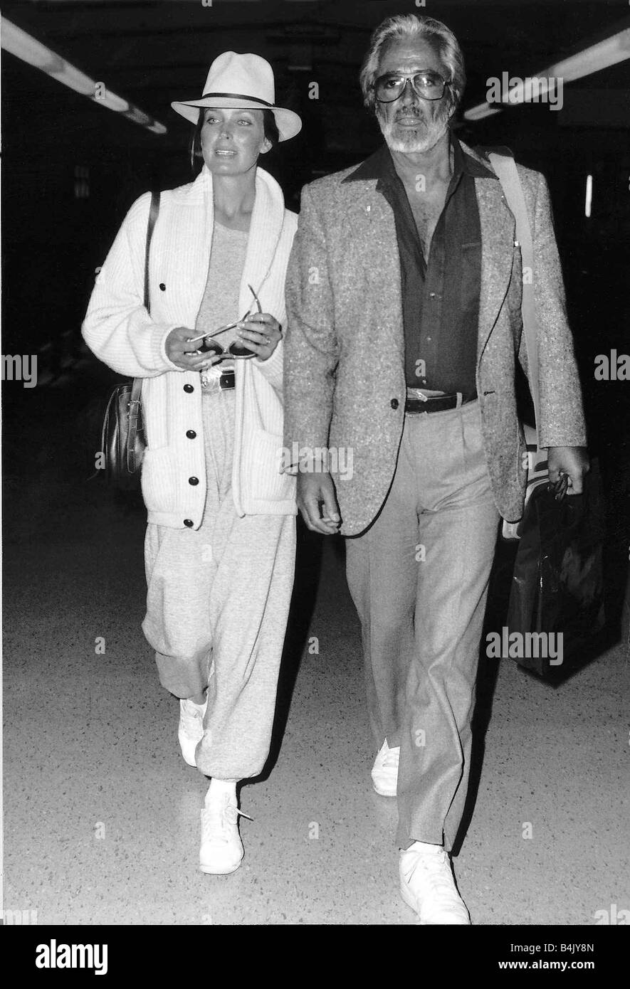 Bo Derek Actress and husband film director John Derek at London airport November 1986 dbase Stock Photo