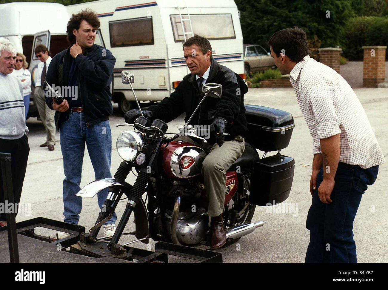 Michael Elphick Actor sitting on a BSA Motor Cycle during the filming of an episode of the TV Series Boon September 1989 dbase Stock Photo