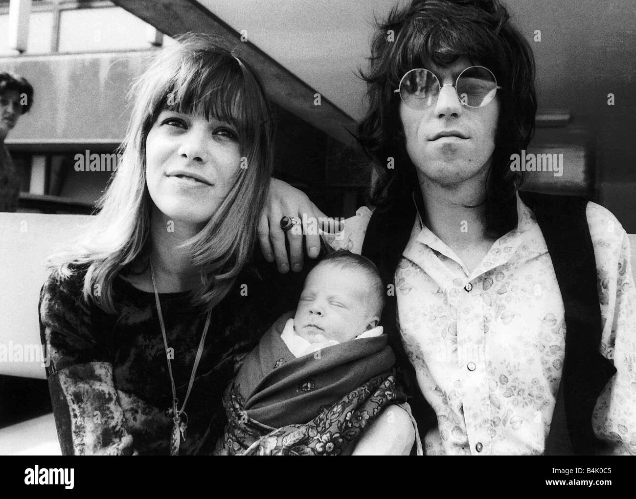 Keith Richards Rolling Stones with German actress Anita Pallenberg and eight day old son Marlon leaving Kings College Hospital Dulwich London Stock Photo