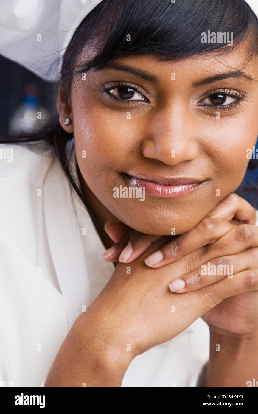 Close up of Mixed Race female pastry chef Stock Photo Alamy