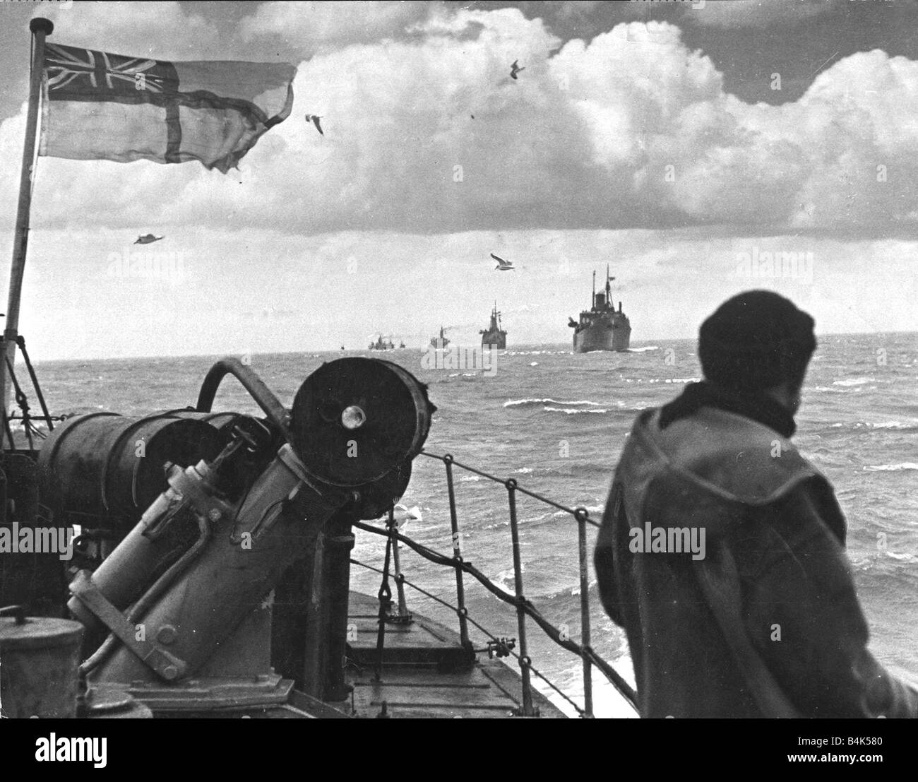 A ship convoy on its way sailing through the North Sea Sailor Second World War WW 2 WW II shipping warships English flag Sea warfare March 1943 1940s Mirrorpix 15 3 1943 Stock Photo