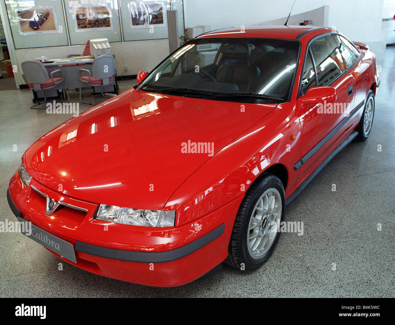 RED VAUXHALL CALIBRA CAR SEPTEMBER 1997 IN SHOWROOM Stock Photo - Alamy